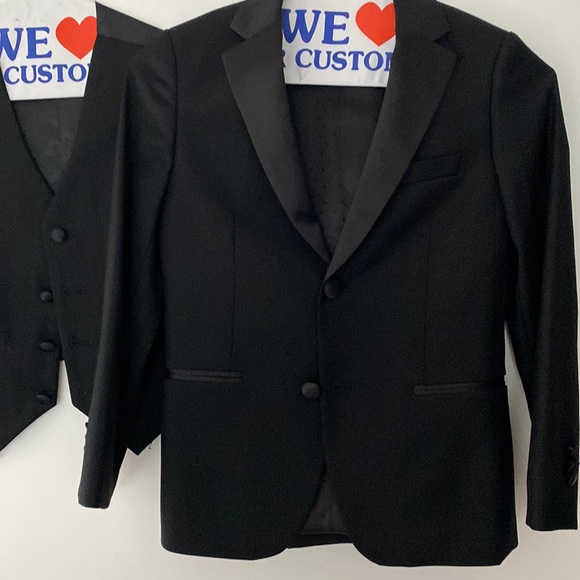 3 piece tuxedo, satin trimmings and bottoms .Viscose and...